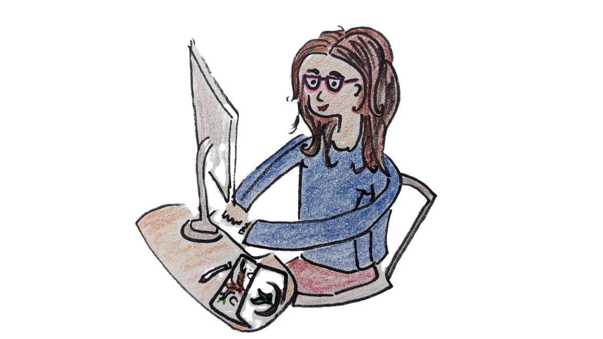 A sketch of the author, Mary Scott, behind a computer with sketches on the side of the desk to depict her working at this blog